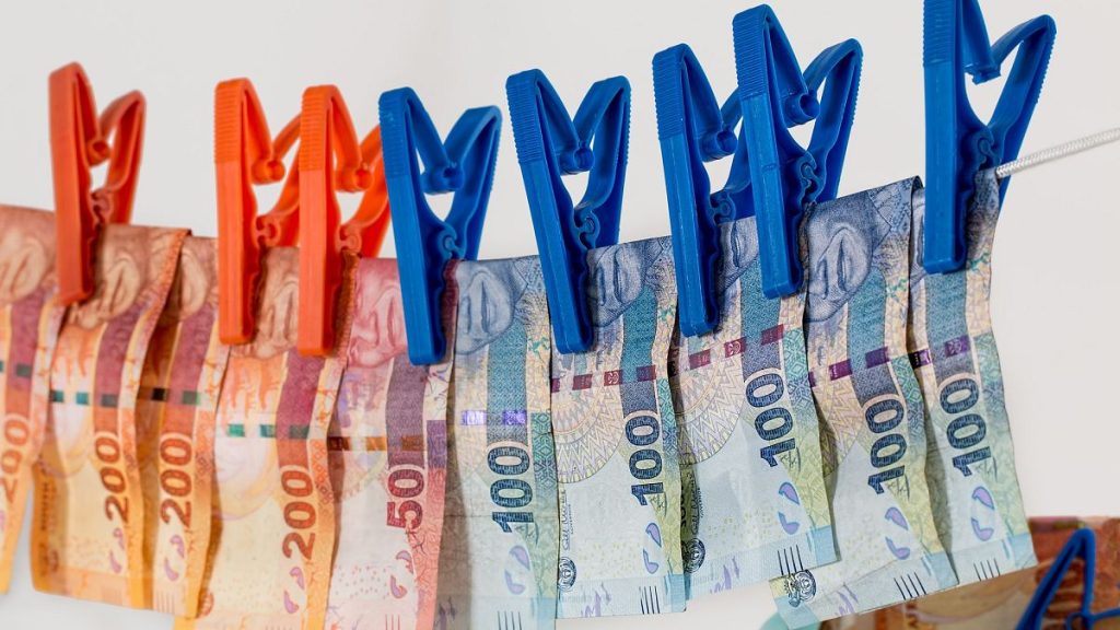 Which city will host the prized new anti-money laundering agency?