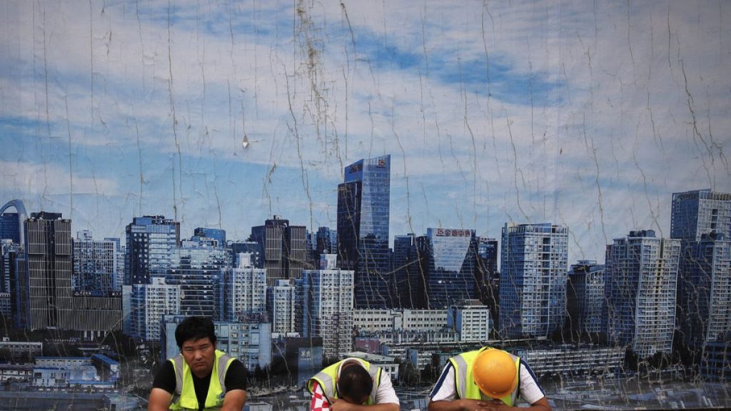 China cuts key interest rate to revive property sector