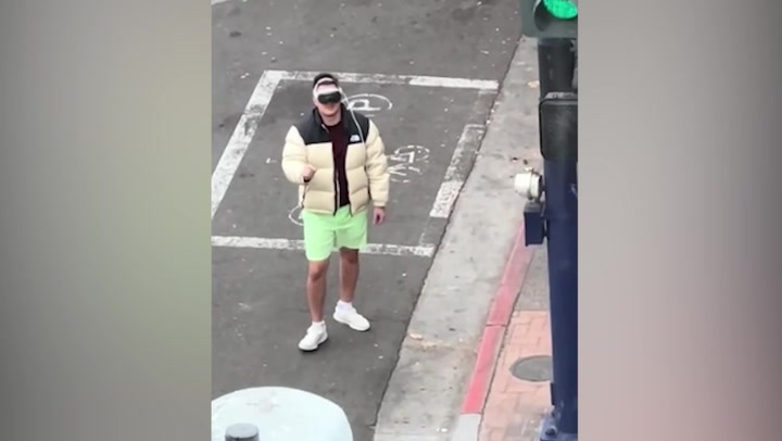 Police stop mid-arrest as man using Apple Vision Pro headset walks by | News