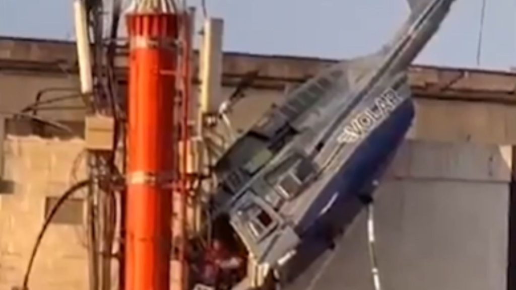 Horror video shows tourist helicopter spin wildly out of control moments after take-off before smashing into building