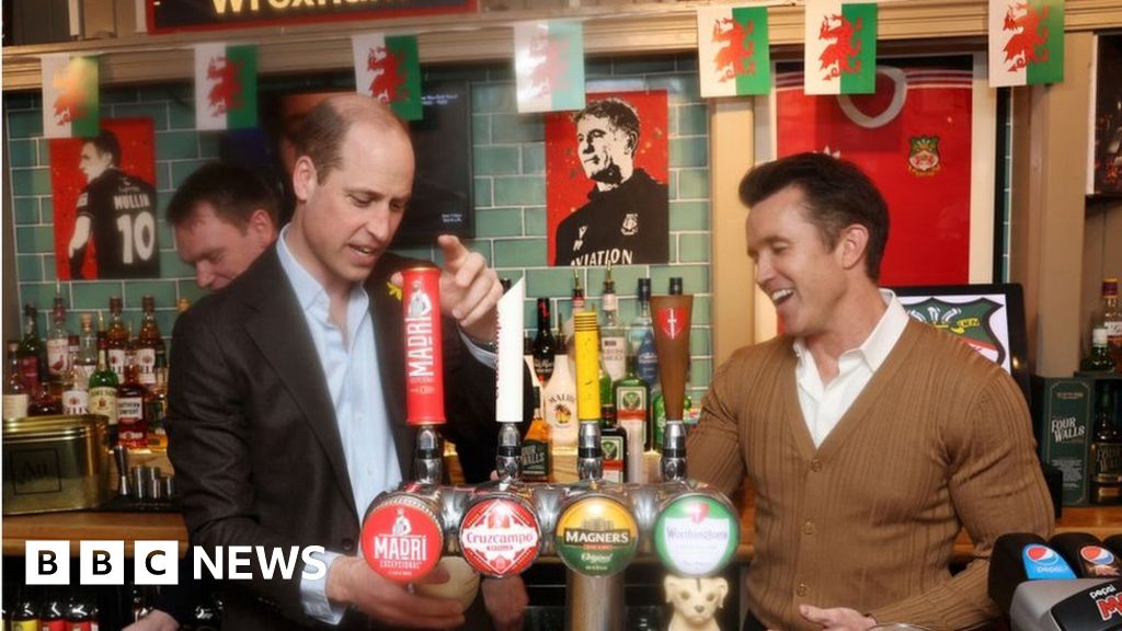 William pulls St David's Day pint with Wrexham owner