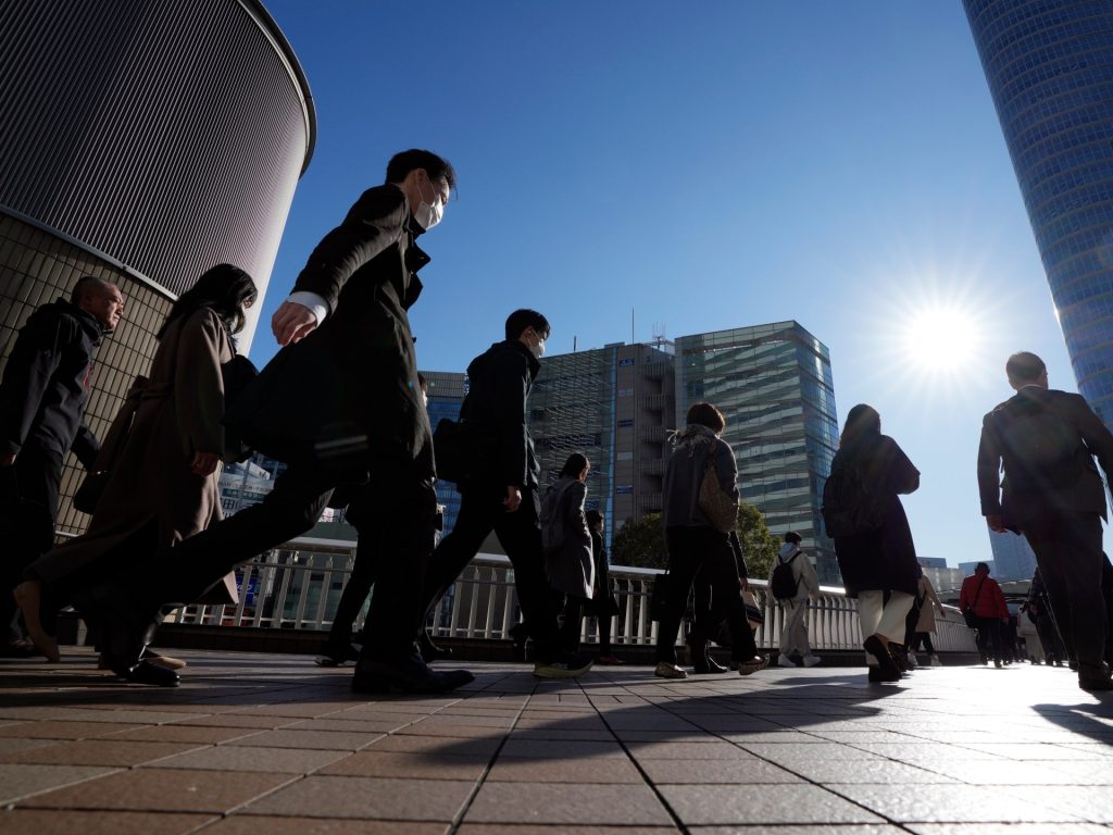 Japan’s economy narrowly avoids recession as growth figures revised | Economy