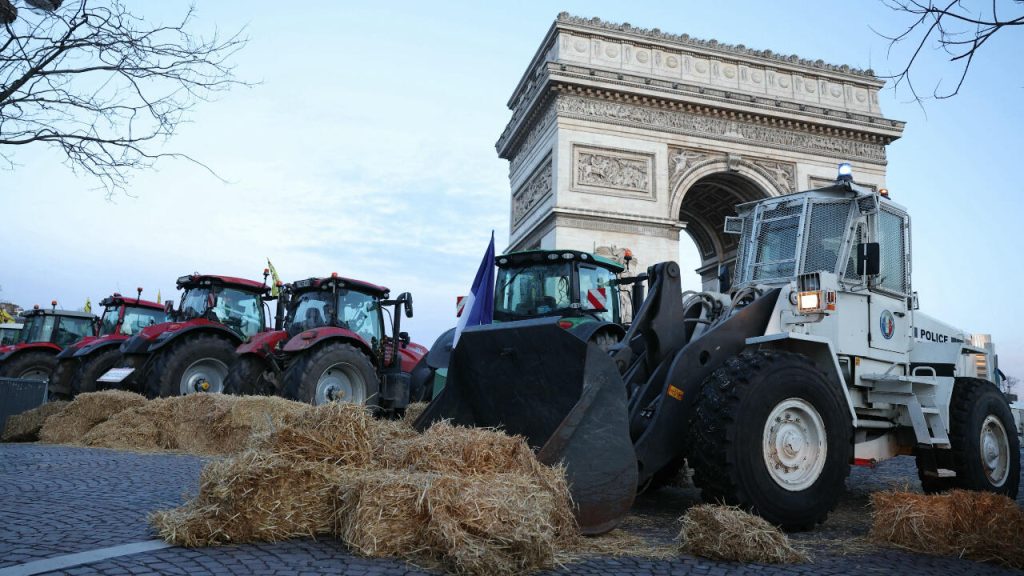 Police arrest more than 60 at farmers’ protest on the Champs-Élysées in Paris
