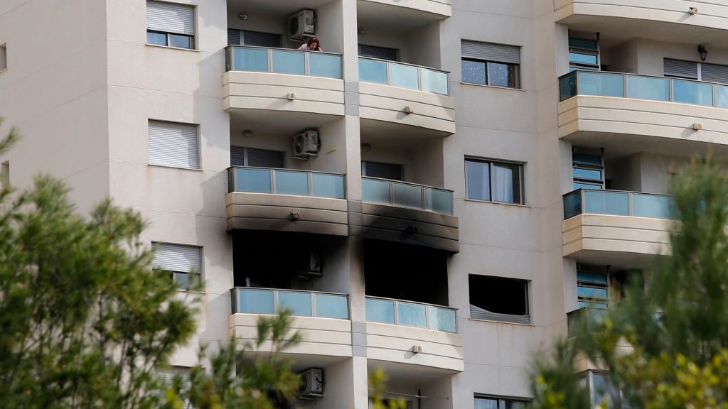 Three members of family die, including boy found hugging pet dog, in Alicante tower block fire | World News