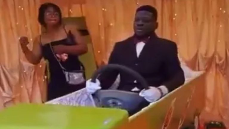 Watch as late cabbie given incredible send-off as body is propped up in spinning TAXI coffin at his funeral in Ghana