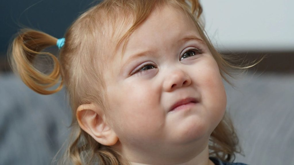 My baby girl was born with adorable big blue eyes – but now they won’t stop growing and she even cries blood