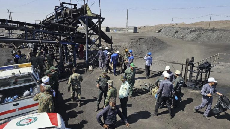 Dozens dead and 18 feared trapped after explosion at coal mine in Iran