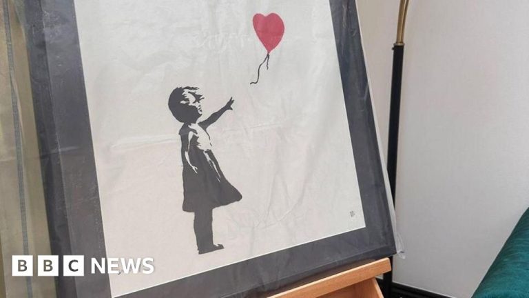 Two charged over stolen Girl with Balloon artwork