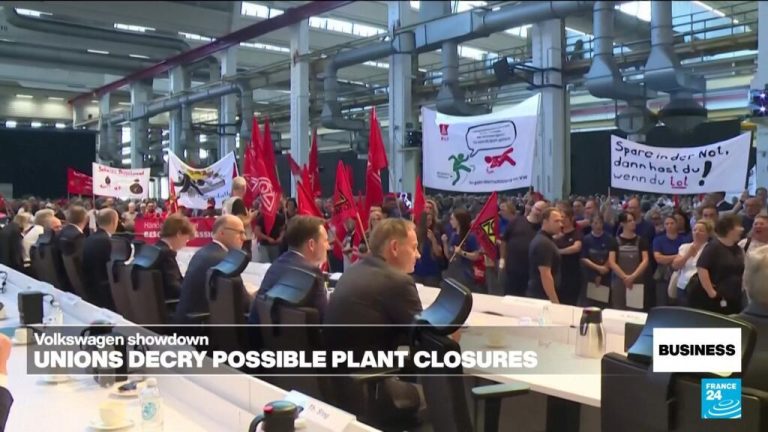 Volkswagen bosses clash with workers over possible plant closures