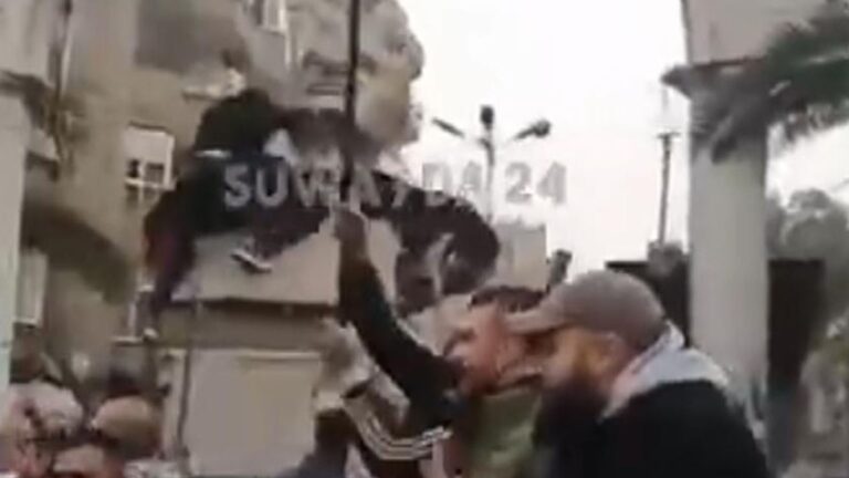 Rebel forces ‘reach Damascus suburbs’ as protesters topple statue on outskirts | World News