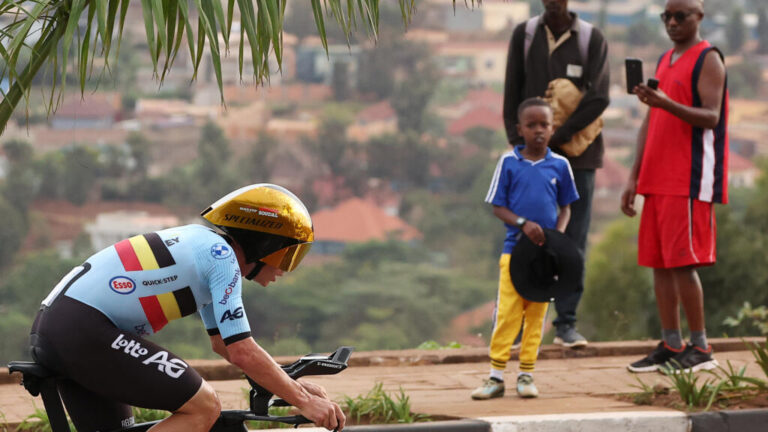 Evenepoel cruises past Pogacar to win third straight time-trial cycling world title