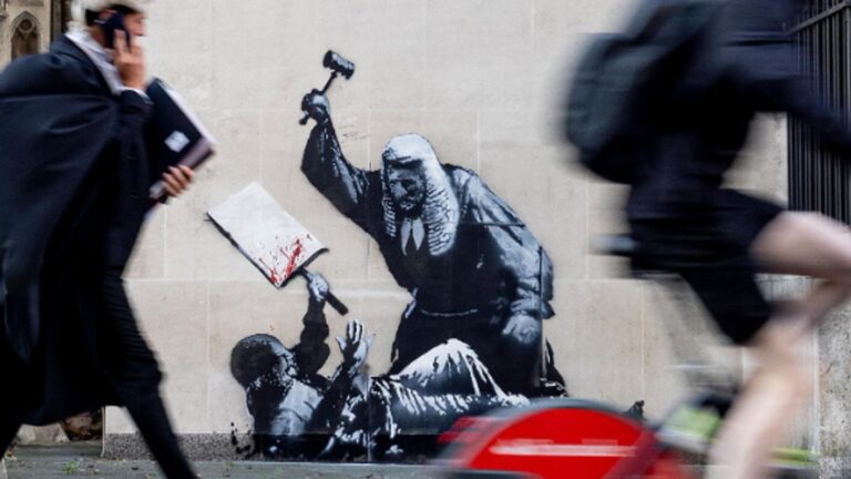New Banksy artwork appears on court building showing judge attacking protester | UK News
