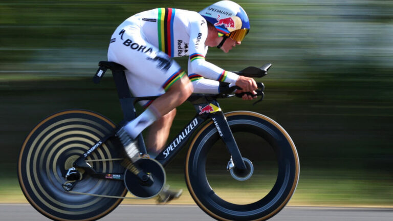 Tour de France: Evenepoel wins time trial to strengthen second overall