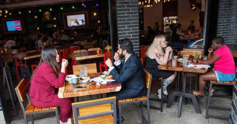 US service sector growth dips in June; employment rebounds after months of contraction